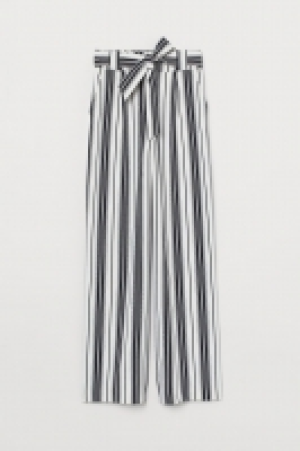  Pantalón con cinturón de atar 20.99 €