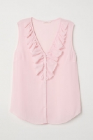  Blusa en V con volante 11.99 €