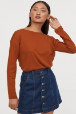  Top de punto con escote barco 8.99 €