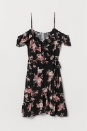  Vestido cruzado con volantes 17.99 €
