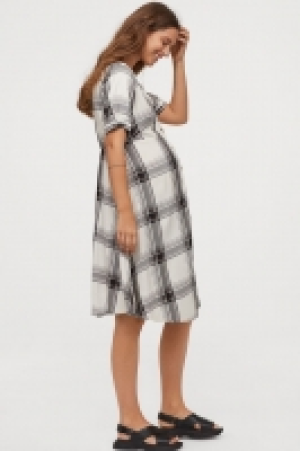  MAMA Vestido con escote en V 11.99 €