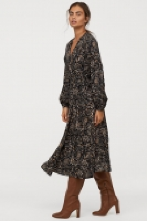  Vestido cruzado en V 27.99 €