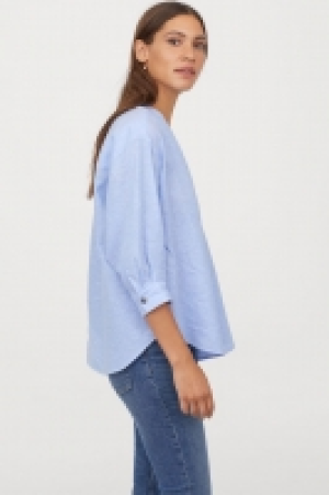  Blusa en mezcla de lino 17.99 €