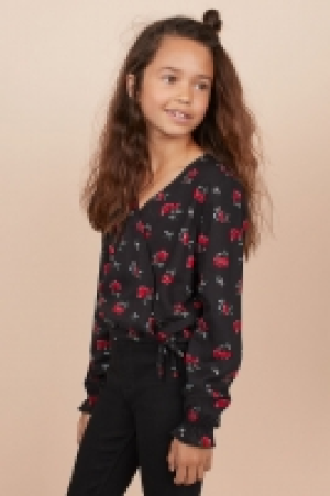 Blusa estampada cruzada 7.99 €