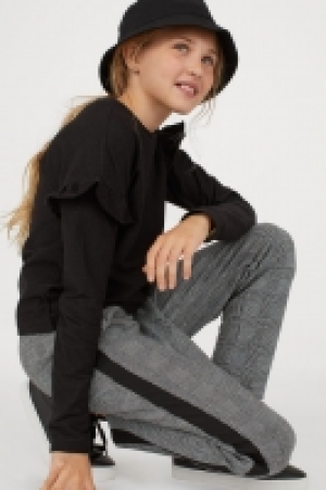  Pantalón con franjas laterales 8.99 €