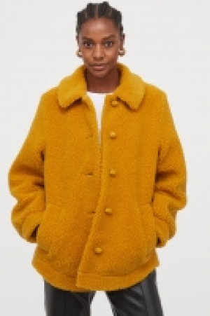  Chaqueta en peluche con cuello 19.99 €