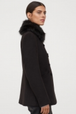  Abrigo con pelo sintético 49.99 €
