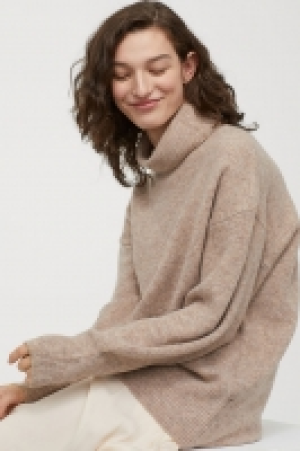  Jersey de cuello alto en punto 22.99 €