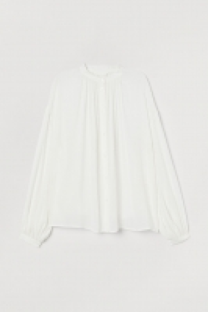  Blusa amplia de viscosa 9.99 €