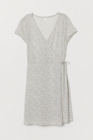  Vestido cruzado de punto 8.99 €