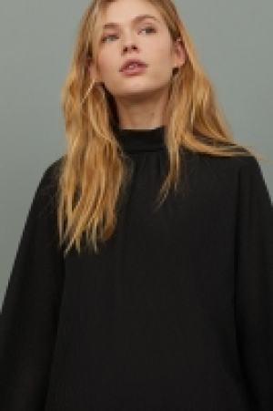  Blusa con lazada 9.99 €