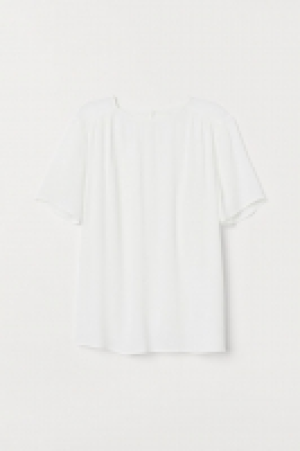  Blusa en tejido de crepé 7.99 €