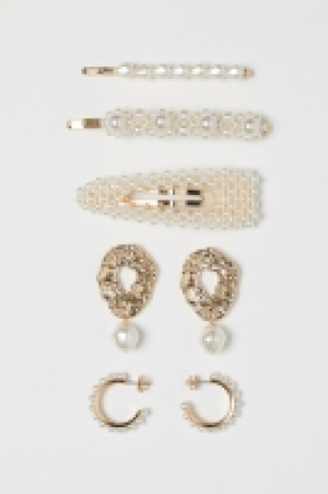  Clips de pelo y pendientes 6.99 €