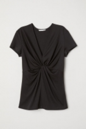  Camiseta con detalle de nudo 11.99 €