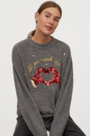  Jersey con lentejuelas 15.99 €