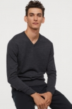  Jersey en V en lana de merino 22.99 €