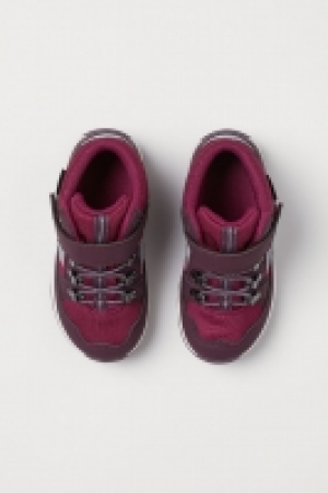  Deportivas altas impermeables 19.99 €