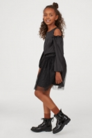  Blusa hombros cut-out 9.99 €