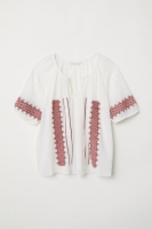  Blusa bordada 19.99 €