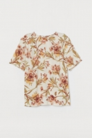  Blusa en tejido de crepé 6.99 €