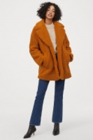  Abrigo corto en peluche 39.99 €