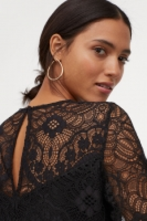  Vestido corto de encaje 24.99 €
