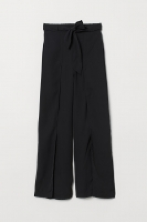  Pantalón con aberturas 12.99 €