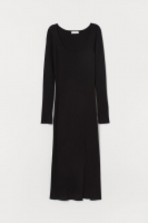  Vestido en punto de canalé 22.99 €