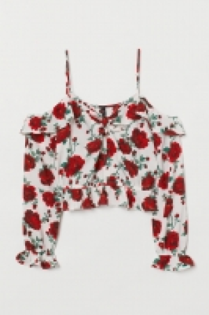  Blusa hombros cut-out 11.99 €