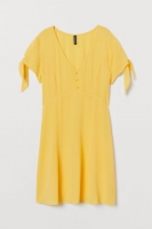  Vestido con escote de pico 11.99 €