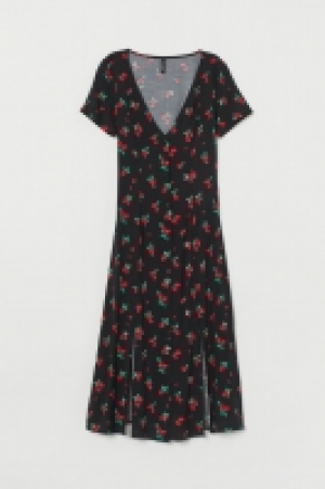  Vestido con escote de pico 16.99 €