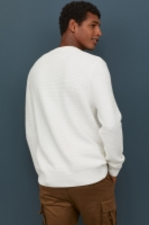  Jersey de punto con textura 12.99 €