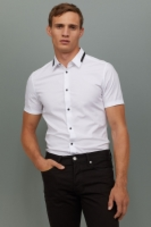 HM   Camisa de algodón Muscle Fit