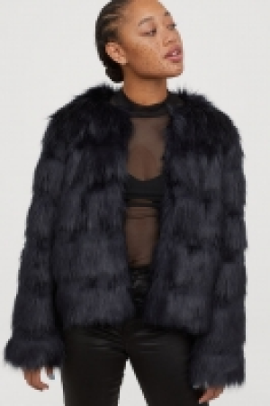  Chaqueta en pelo sintético 29.99 €