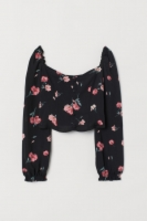  Blusa con mangas abullonadas 8.99 €