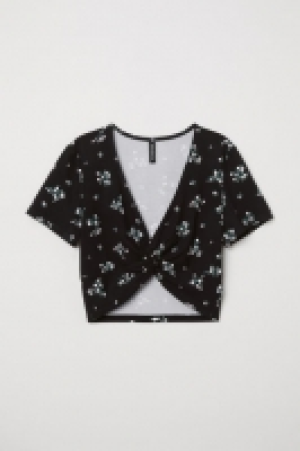  Top corto con lazada 8.99 €