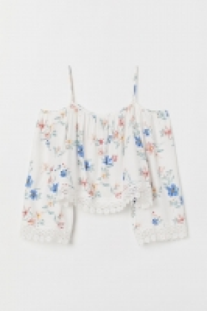  Blusa hombro descubierto 11.99 €
