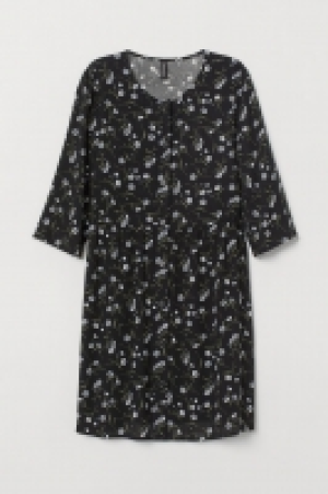 Vestido con botones 12.99 €