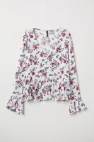  Blusa en V con botones 11.99 €