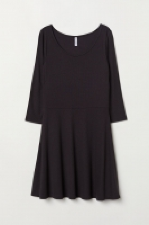  Vestido en punto de canalé 8.99 €