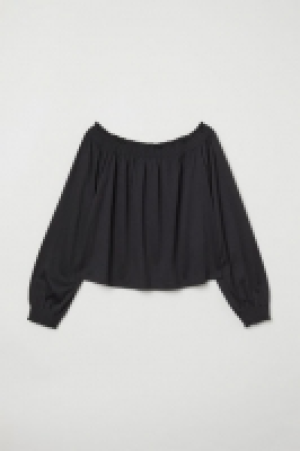  Blusa hombro descubierto 3.99 €