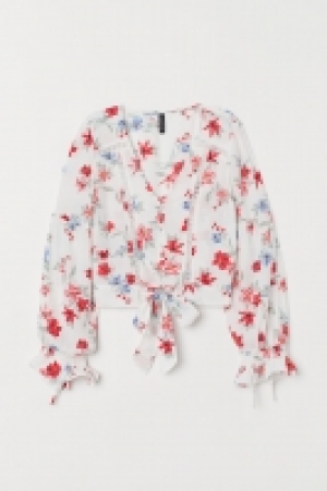  Blusa con escote en V 11.99 €