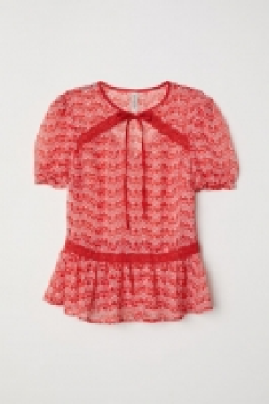  Blusa con mangas abullonadas 16.99 €