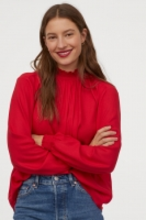  Blusa con cuello elevado 13.99 €