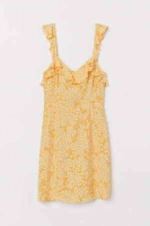  Vestido con volantes 23.99 €