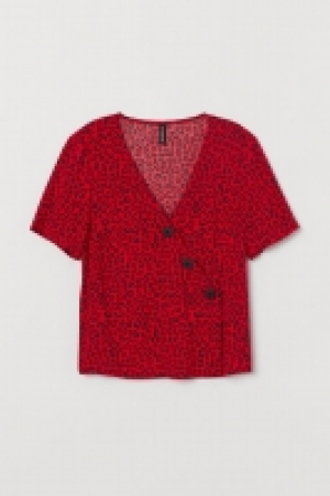  Blusa con escote de pico 7.99 €