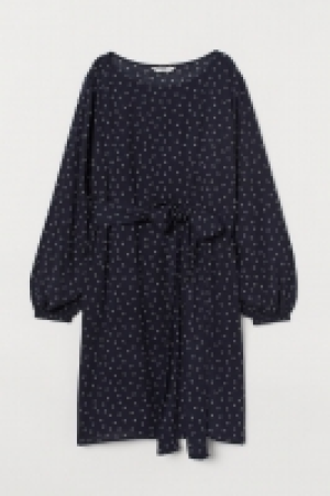  Vestido con cinturón de anudar 19.99 €