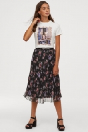  Falda plisada 13.99 €