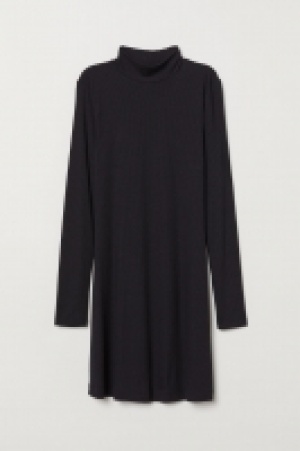  Vestido en punto de canalé 11.99 €