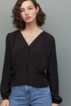  Blusa en tejido de crepé 9.99 €